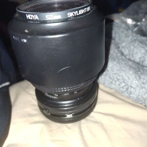 Black Camera Lens with Skylight Filter